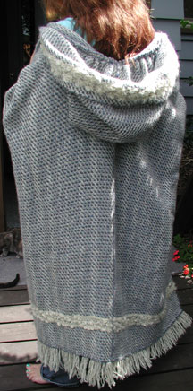 A hooded wool ruana