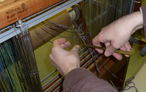 Threading the heddles