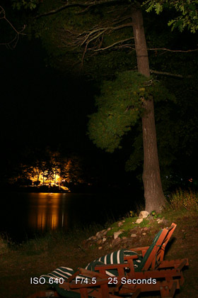 Light painting above a tree stump