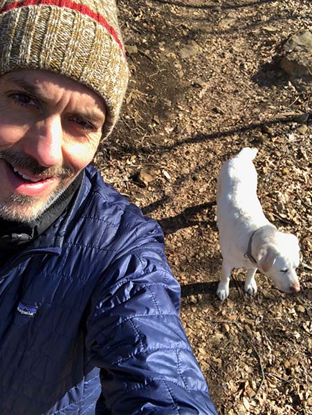 selfie of me and my white dog on the trails
