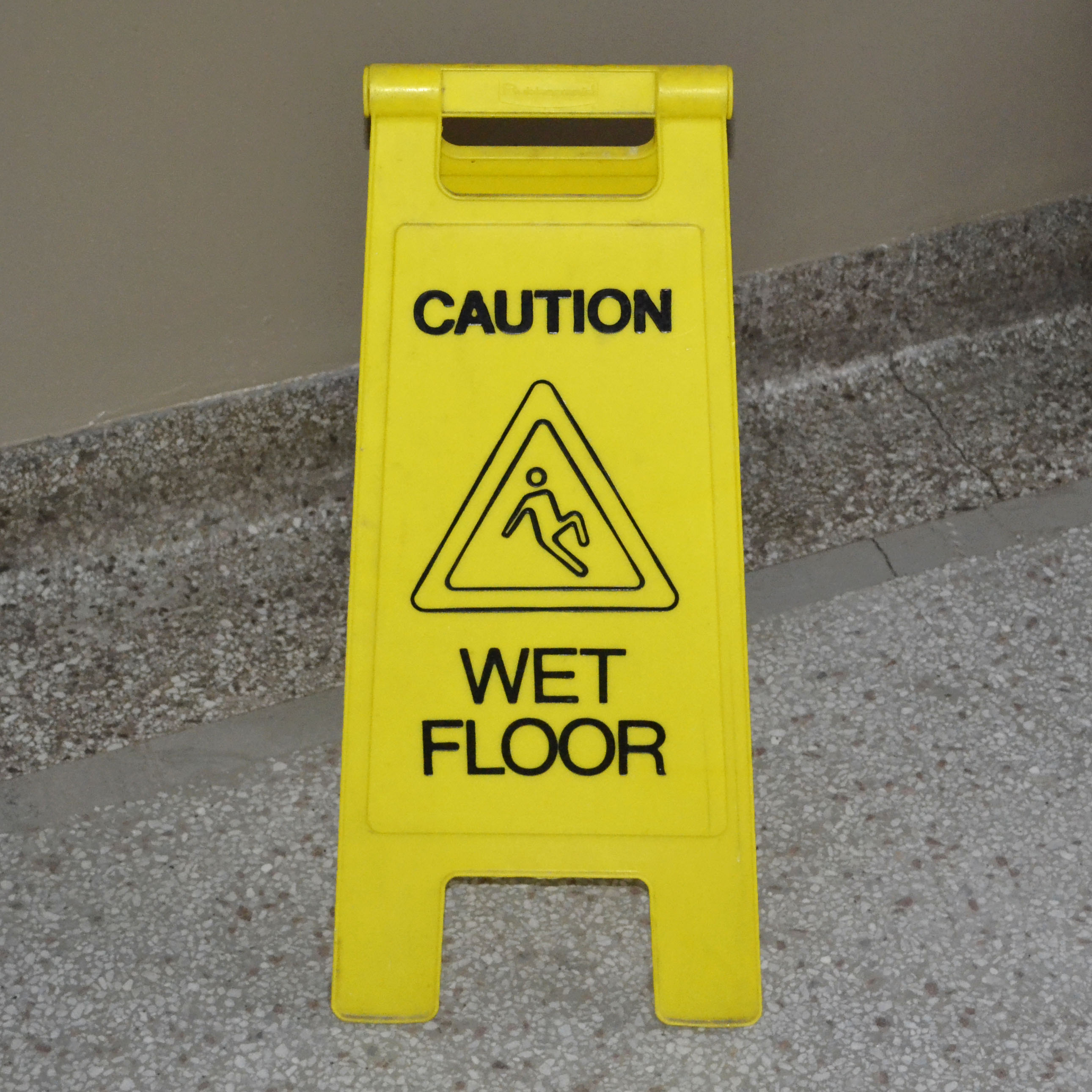 Yellow wet floor sign