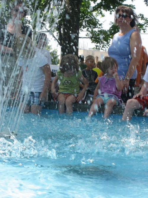 Kids cool off in the fountain